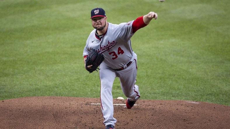 Jul 24, 2021; Baltimore, Maryland, USA; Washington Nationals starting pitcher Jon Lester (34) pitches against the Baltimore Orioles during the first inning at Oriole Park at Camden Yards. Mandatory Credit: Scott Taetsch-USA TODAY Sports