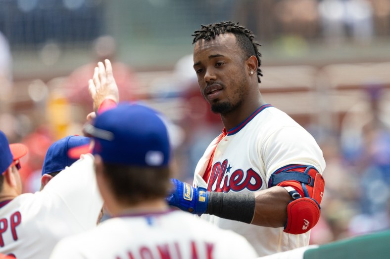 Jul 25, 2021; Philadelphia, Pennsylvania, USA; Philadelphia Phillies shortstop Jean Segura (2) is congratulated after hitting a home run during the fourth inning against the Atlanta Braves at Citizens Bank Park. Mandatory Credit: Bill Streicher-USA TODAY Sports
