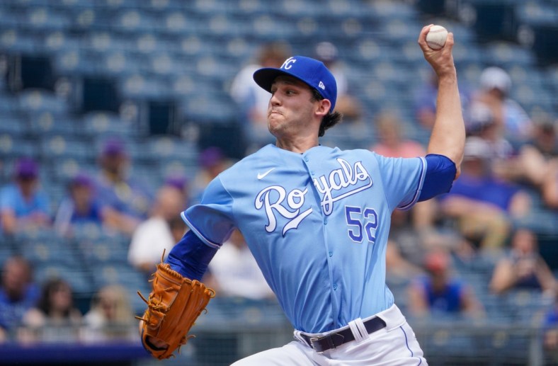 Jul 25, 2021; Kansas City, Missouri, USA; Kansas City Royals starting pitcher Daniel Lynch (52) delivers a pitch in the first inning against the Detroit Tigers at Kauffman Stadium. Mandatory Credit: Denny Medley-USA TODAY Sports