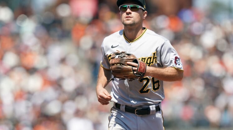 Jul 25, 2021; San Francisco, California, USA; Pittsburgh Pirates second baseman Adam Frazier (26) jogs off the field at the end of the sixth inning against the San Francisco Giants at Oracle Park. Mandatory Credit: Darren Yamashita-USA TODAY Sports