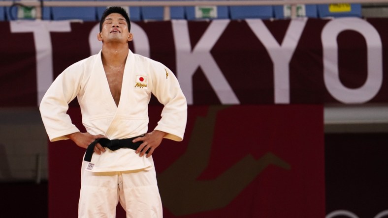 Jul 26, 2021; Tokyo, Japan; Shohei Ono (JPN) reacts after winning the men's 73 kg gold medal during the Tokyo 2020 Olympic Summer Games at Nippon Budokan. Mandatory Credit: Mandi Wright-USA TODAY Sports