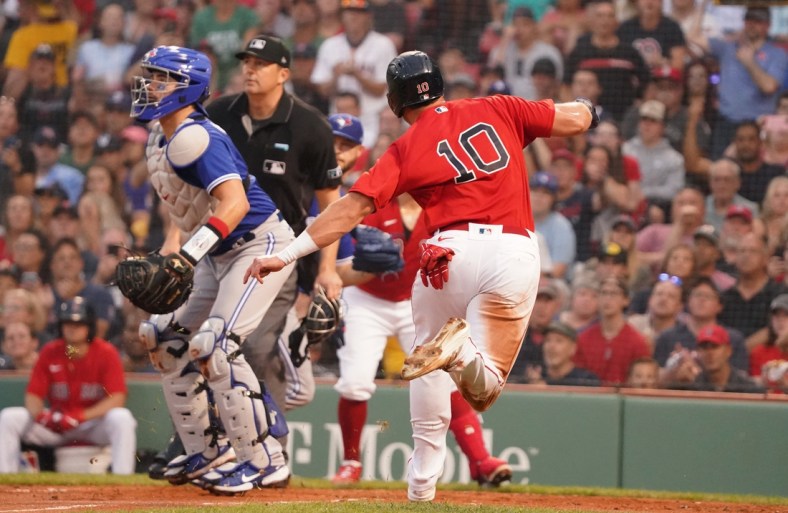 Jul 26, 2021; Boston, Massachusetts, USA; Boston Red Sox right fielder Hunter Renfroe (10) scores against the Toronto Blue Jays in the second inning at Fenway Park. Mandatory Credit: David Butler II-USA TODAY Sports