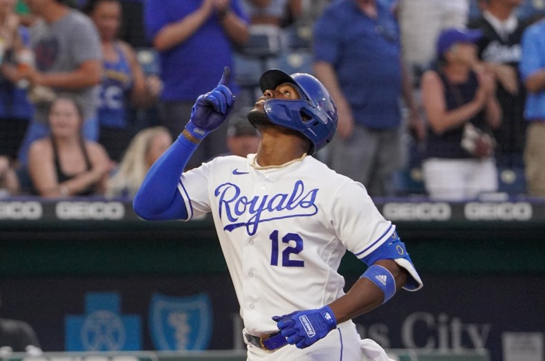 Jul 26, 2021; Kansas City, Missouri, USA; Kansas City Royals designated hitter Jorge Soler (12) celebrates while running the bases after hitting a solo home run in the fourth inning against the Chicago White Sox at Kauffman Stadium. Mandatory Credit: Denny Medley-USA TODAY Sports