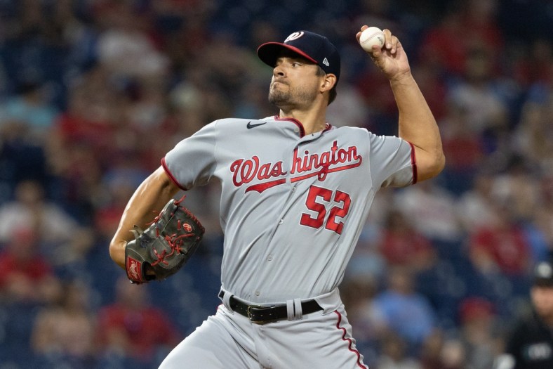 Jul 27, 2021; Philadelphia, Pennsylvania, USA; Washington Nationals relief pitcher Brad Hand (52) throws against the Philadelphia Phillies during the ninth inning at Citizens Bank Park. Mandatory Credit: Bill Streicher-USA TODAY Sports