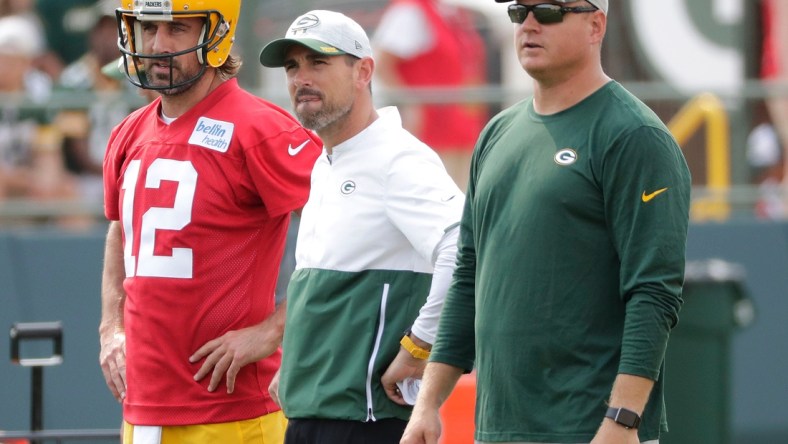 Green Bay Packers quarterback Aaron Rodgers, head coach Matt LaFleur and quarterbacks coach Luke Getsy look on during Wednesday's practice.Nfl Green Bay Packers Training Camp