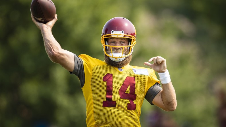 Jul 29, 2021; Richmond, VA, USA; Washington Football Team quarterback Ryan Fitzpatrick (14) attempts a pass during training camp at Bon Secours Washington Redskins Training Cennter. Mandatory Credit: Scott Taetsch-USA TODAY Sports