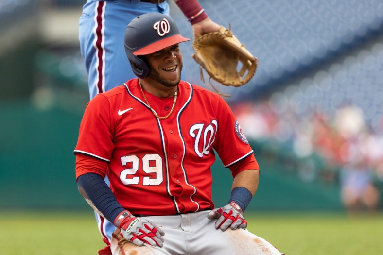 Jul 29, 2021; Philadelphia, Pennsylvania, USA; Washington Nationals outfielder Yadiel Hernandez (29) reacts at third base after his two-run RBI hit during the first inning against the Philadelphia Phillies at Citizens Bank Park. Mandatory Credit: Bill Streicher-USA TODAY Sports