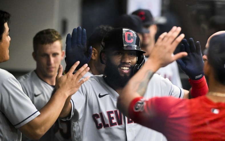 Jul 31, 2021; Chicago, Illinois, USA;  Cleveland Indians shortstop Amed Rosario (1) celebrates with the dugout after hitting a home run against the bChicago White Sox during the fourth inning at Guaranteed Rate Field. Mandatory Credit: Matt Marton-USA TODAY Sports