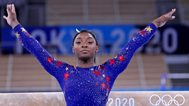 Simone Biles out of Team USA gymnastics final, coach cites 'mental issue' as reason