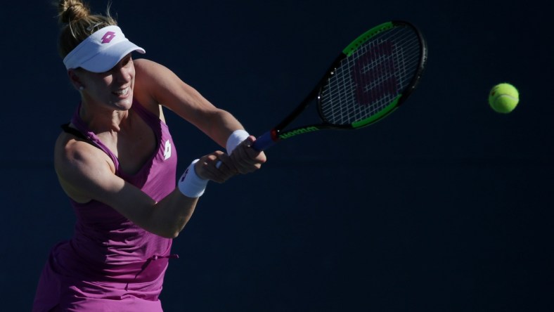 Aug 29, 2019; Flushing, NY, USA; Alison Riske of the United States returns a shot against Jelena Ostapenko of Latvia in a second round match on day four of the 2019 U.S. Open tennis tournament at USTA Billie Jean King National Tennis Center. Mandatory Credit: Jerry Lai-USA TODAY Sports