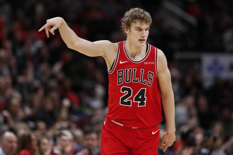 Dec 30, 2019; Chicago, Illinois, USA; Chicago Bulls forward Lauri Markkanen (24) reacts after scoring against the Milwaukee Bucks during the first half at United Center. Mandatory Credit: Kamil Krzaczynski-USA TODAY Sports