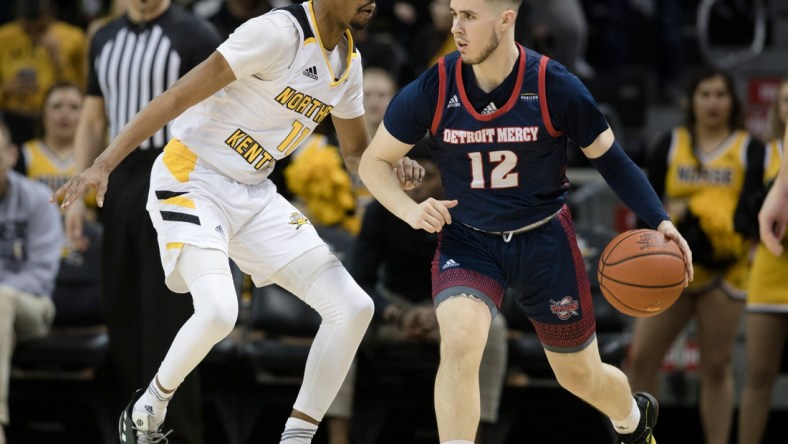 Northern Kentucky Norse guard Adham Eleeda (1) guards Detroit Titans guard Brad Calipari (12) in the second half of the NCAA basketball game on Saturday, Feb. 8, 2020, at BB&T Arena in Highland Heights, Ky. Northern Kentucky Norse defeated Detroit Titans 84-65.

Northern Kentucky Norse Vs Detroit Titans 00392