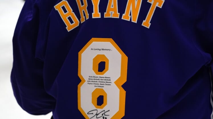 Feb 23, 2020; Los Angeles, California, USA; Detailed view of the back of Los Angeles Lakers jersey worn by Los Angeles Kings goalkeeper Los Angeles Kings goaltender Jonathan Quick (32) with the numeral 8 and the words "In the Loving Memory of Kobe Bryant, Gianna Bryant, Alyssa Altobelli, Keri Altobelli, John Altobelli, Christina Mauser, Payton Chester, Sarah Chester and Ara Zobyan" before the NHL game against the Edmonton Oilers  at Staples Center. Mandatory Credit: Kirby Lee-USA TODAY Sports