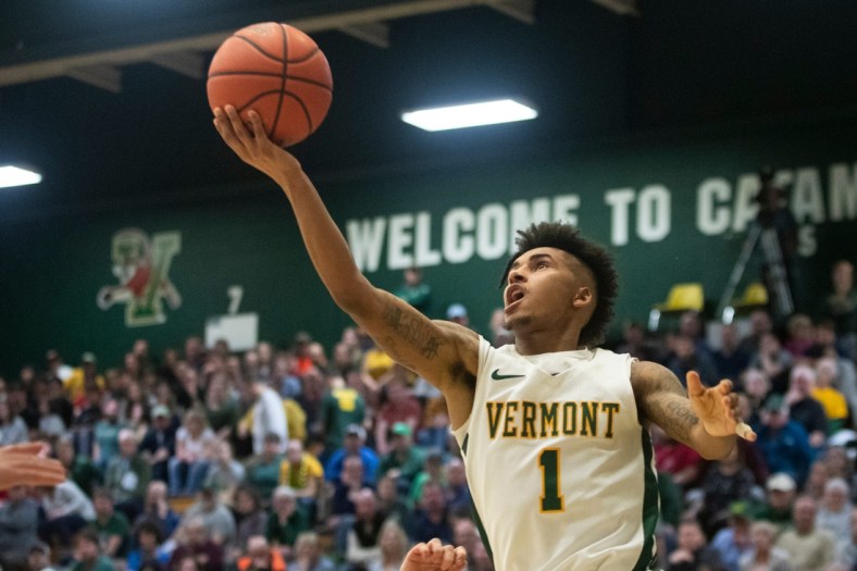 Vermont's Aaron Deloney (1) Leaps for a layup during the men's basketball game between the Albany Great Danes and the Vermont Catamounts at Patrick Gym on Tuesday night March 3, 2020 in Burlington, Vermont.

Albany Vs Vermont Men S Basketball 3 3 20