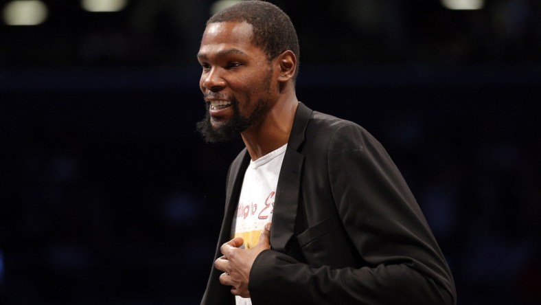 Feb 3, 2020; Brooklyn, New York, USA; Brooklyn Nets small forward Kevin Durant (7) smiles during a time out during the second quarter against the Phoenix Suns at Barclays Center. Mandatory Credit: Brad Penner-USA TODAY Sports