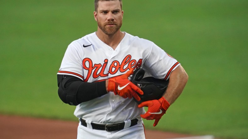 Jul 9, 2020; Baltimore, Maryland, United States; Baltimore Orioles first baseman Chris Davis (19) returns to the dugout during a practice game at Oriole Park at Camden Yards. Mandatory Credit: Mitch Stringer-USA TODAY Sports