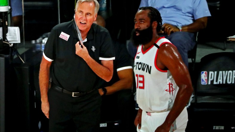 Sep 4, 2020; Lake Buena Vista, Florida, USA; Houston Rockets head coach Mike D'Antoni and guard James Harden (13) talks during the second quarter against the Los Angeles Lakers in game one of the second round of the 2020 NBA Playoffs at AdventHealth Arena. Mandatory Credit: Kim Klement-USA TODAY Sports