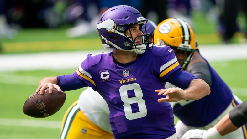 Sep 13, 2020; Minneapolis, Minnesota, USA; Minnesota Vikings quarterback Kirk Cousins (8) passes in the second quarter against the Green Bay Packers at U.S. Bank Stadium. Mandatory Credit: Brad Rempel-USA TODAY Sports