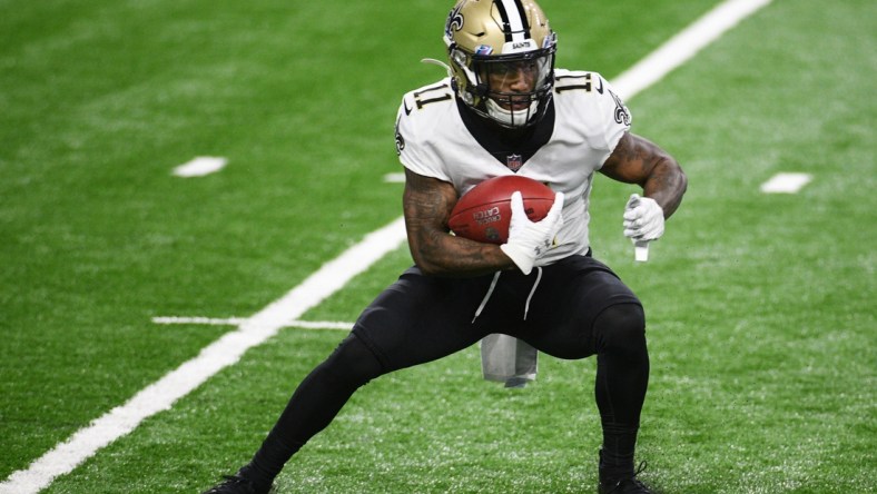 Oct 4, 2020; Detroit, Michigan, USA; New Orleans Saints wide receiver Deonte Harris (11) runs the ball against the Detroit Lions during the first quarter at Ford Field. Mandatory Credit: Tim Fuller-USA TODAY Sports