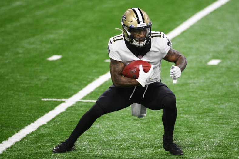 Oct 4, 2020; Detroit, Michigan, USA; New Orleans Saints wide receiver Deonte Harris (11) runs the ball against the Detroit Lions during the first quarter at Ford Field. Mandatory Credit: Tim Fuller-USA TODAY Sports