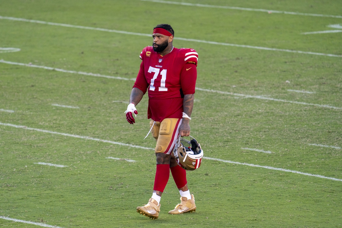 San Francisco 49ers tackle Trent Williams (71) walks on the