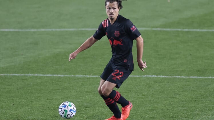 Oct 28, 2020; Harrison, New Jersey, USA; New York Red Bulls midfielder Florian Valot (22) plays the ball during the first half against the New England Revolution at Red Bull Arena. Mandatory Credit: Vincent Carchietta-USA TODAY Sports