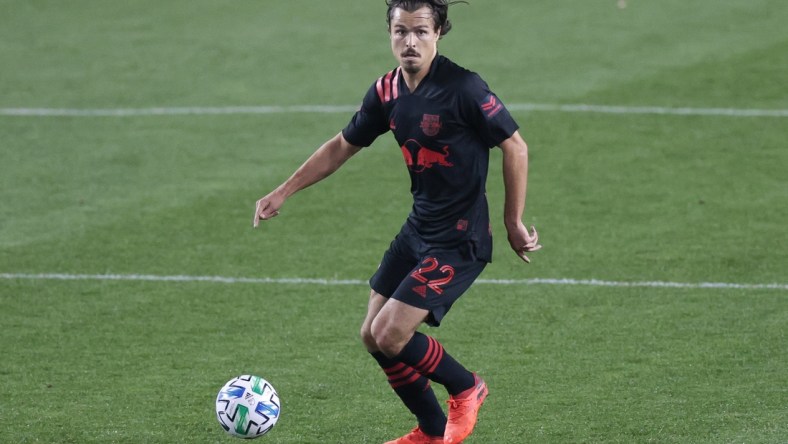 Oct 28, 2020; Harrison, New Jersey, USA; New York Red Bulls midfielder Florian Valot (22) plays the ball during the first half against the New England Revolution at Red Bull Arena. Mandatory Credit: Vincent Carchietta-USA TODAY Sports