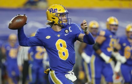 Nov 21, 2020; Pittsburgh, Pennsylvania, USA;  Pittsburgh Panthers quarterback Kenny Pickett (8) passes against the Virginia Tech Hokies during the second quarter at Heinz Field. Pittsburgh won 47-14. Mandatory Credit: Charles LeClaire-USA TODAY Sports