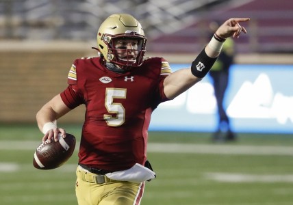 Nov 28, 2020; Chestnut Hill, Massachusetts, USA; Boston College Eagles quarterback Phil Jurkovec (5) directs his receivers during the first half against the Louisville Cardinals at Alumni Stadium. Mandatory Credit: Winslow Townson-USA TODAY Sports
