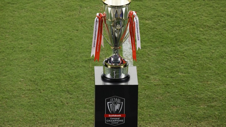 Dec 22, 2020; Orlando, Florida, USA; The Scotiabank CONCACAF Champions trophy sits at mid field during warmups before the match at the 2020 SCCL final at Exploria Stadium. Mandatory Credit: Reinhold Matay-USA TODAY Sports