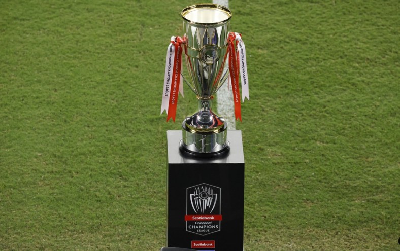 Dec 22, 2020; Orlando, Florida, USA; The Scotiabank CONCACAF Champions trophy sits at mid field during warmups before the match at the 2020 SCCL final at Exploria Stadium. Mandatory Credit: Reinhold Matay-USA TODAY Sports