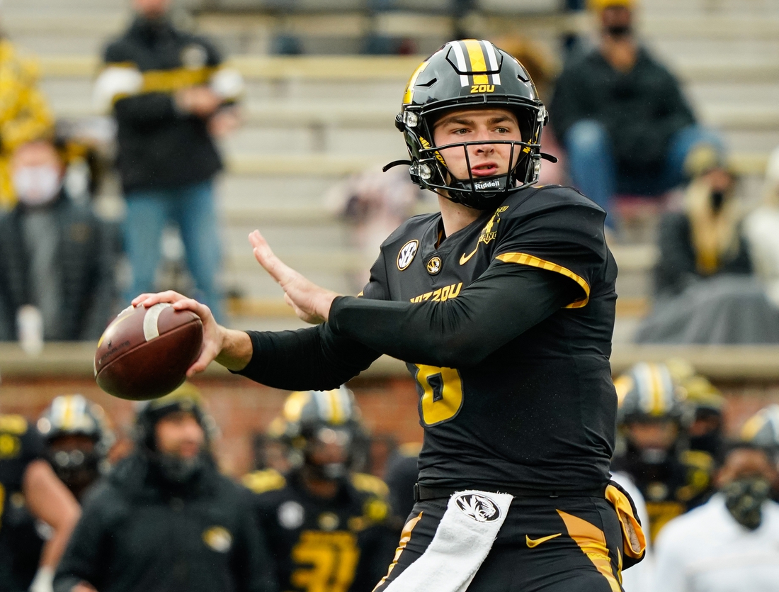 Dec 12, 2020; Columbia, Missouri, USA; Missouri Tigers quarterback Connor Bazelak (8) throws a pass against the Georgia Bulldogs during the first half at Faurot Field at Memorial Stadium. Mandatory Credit: Jay Biggerstaff-USA TODAY Sports