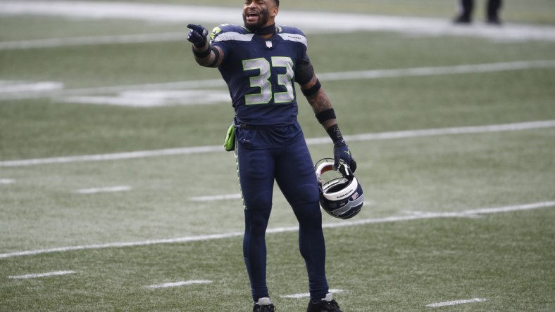 Jan 9, 2021; Seattle, Washington, USA; Seattle Seahawks safety Jamal Adams (33) yells to the sidelines during the first quarter against the Los Angeles Rams at Lumen Field. Mandatory Credit: Joe Nicholson-USA TODAY Sports