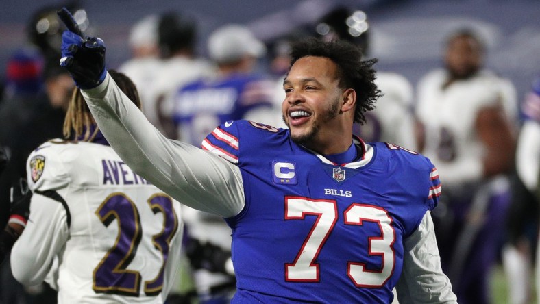 Bills Dion Dawkins celebrates with fans after Buffalo beat the Ravens 17-3.

Jg 011620 Bills 11