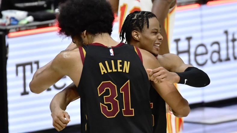 Feb 23, 2021; Cleveland, Ohio, USA; Cleveland Cavaliers center Jarrett Allen (31) and guard Isaac Okoro (35) celebrate after the Cavs beat the Atlanta Hawks at Rocket Mortgage FieldHouse. Mandatory Credit: Ken Blaze-USA TODAY Sports