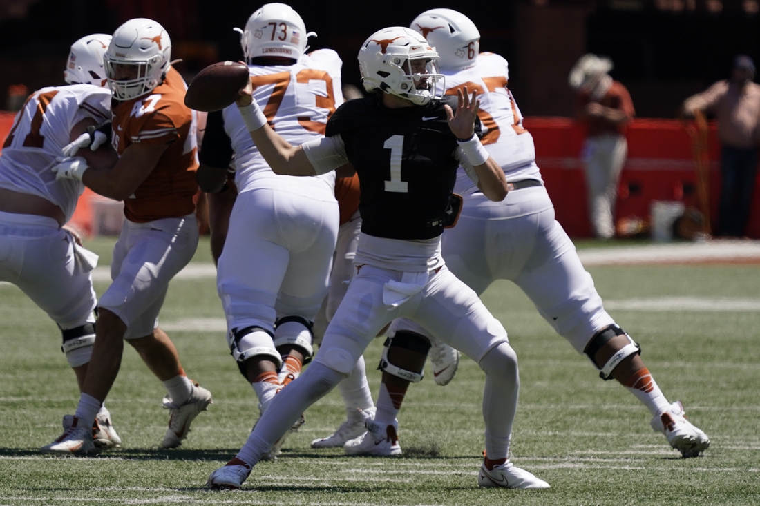 Apr 24, 2021; Austin, Texas, USA; Texas Longhorns White quarterback Hudson Card (1) throws a pass during the third quarter against the Orange team at the Orange-White Texas Spring Game at Darrell K Royal-Texas Memorial Stadium. Mandatory Credit: Scott Wachter-USA TODAY Sports