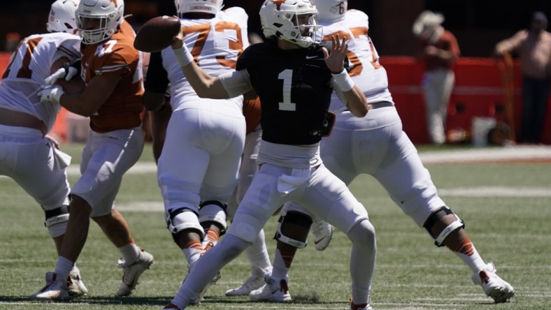 Apr 24, 2021; Austin, Texas, USA; Texas Longhorns White quarterback Hudson Card (1) throws a pass during the third quarter against the Orange team at the Orange-White Texas Spring Game at Darrell K Royal-Texas Memorial Stadium. Mandatory Credit: Scott Wachter-USA TODAY Sports