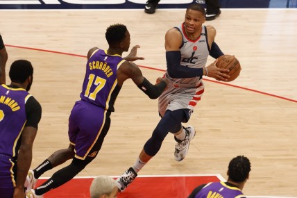 Apr 28, 2021; Washington, District of Columbia, USA; Washington Wizards guard Russell Westbrook (4) drives to the basket as Los Angeles Lakers guard Dennis Schroder (17) defends in the first quarter at Capital One Arena. Mandatory Credit: Geoff Burke-USA TODAY Sports