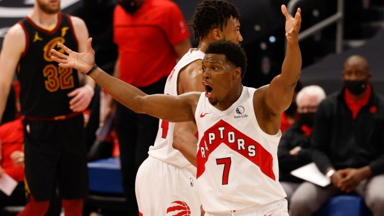 Apr 26, 2021; Tampa, Florida, USA;  Toronto Raptors guard Kyle Lowry (7) reacts to a called foul in the third quarter in a game against the Cleveland Cavaliers at Amalie Arena. Mandatory Credit: Nathan Ray Seebeck-USA TODAY Sports