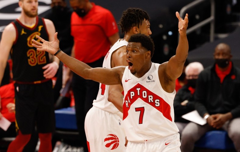 Apr 26, 2021; Tampa, Florida, USA;  Toronto Raptors guard Kyle Lowry (7) reacts to a called foul in the third quarter in a game against the Cleveland Cavaliers at Amalie Arena. Mandatory Credit: Nathan Ray Seebeck-USA TODAY Sports