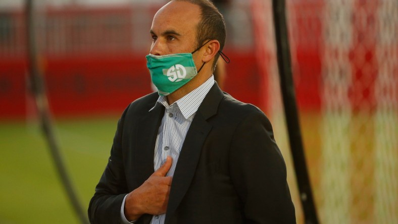 April 30, 2021; Phoenix, Arizona, USA; SD Loyal manager Landon Donovan puts his hand over his heart during the national anthem during the season opener at the Phoenix Rising's new stadium.  Patrick Breen-Arizona Republic

Sd Loyal Vs Phoenix Rising