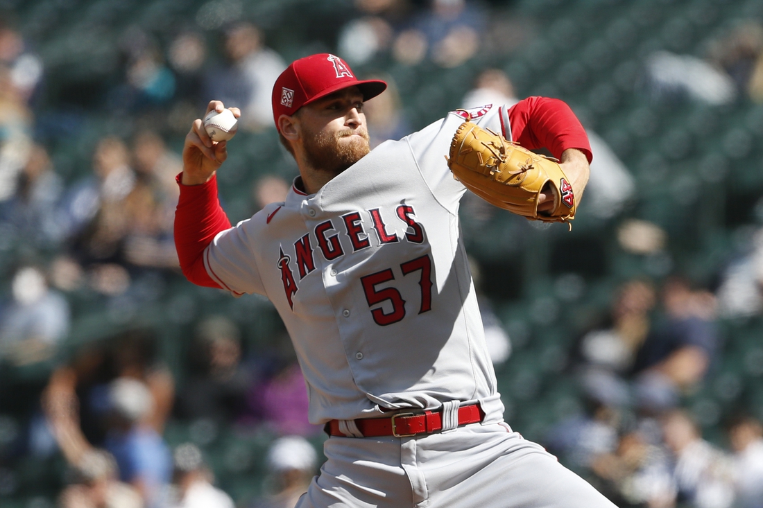 May 2, 2021; Seattle, Washington, USA; Los Angeles Angels relief pitcher Aaron Slegers (57) throws against the Seattle Mariners during the seventh inning at T-Mobile Park. Mandatory Credit: Joe Nicholson-USA TODAY Sports