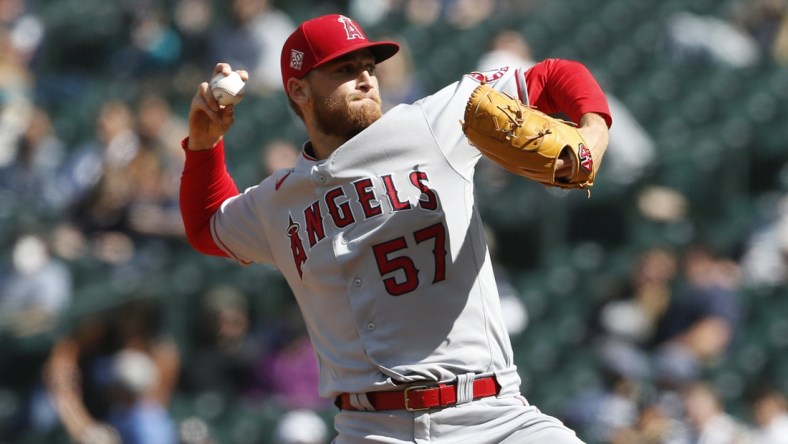 May 2, 2021; Seattle, Washington, USA; Los Angeles Angels relief pitcher Aaron Slegers (57) throws against the Seattle Mariners during the seventh inning at T-Mobile Park. Mandatory Credit: Joe Nicholson-USA TODAY Sports