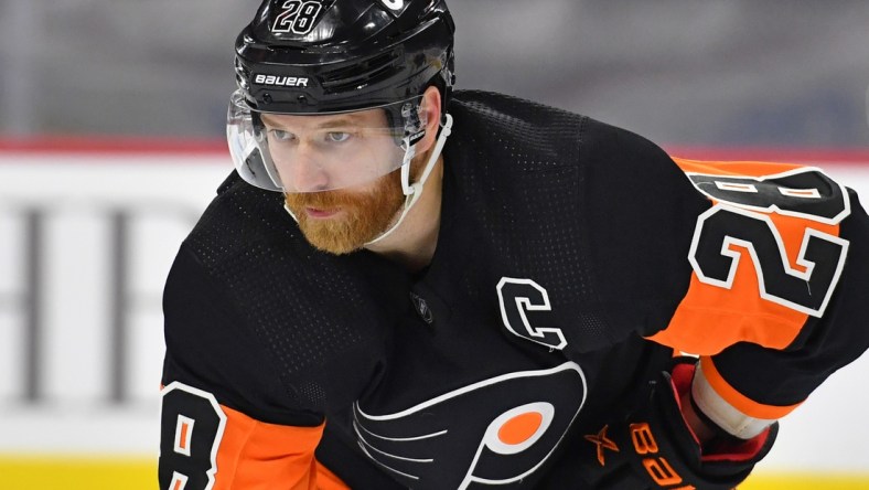 May 1, 2021; Philadelphia, Pennsylvania, USA; Philadelphia Flyers center Claude Giroux (28) against the New Jersey Devils  at Wells Fargo Center. Mandatory Credit: Eric Hartline-USA TODAY Sports