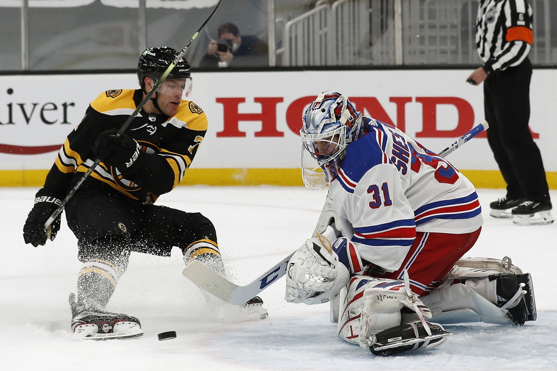 May 8, 2021; Boston, Massachusetts, USA; New York Rangers goaltender Igor Shesterkin (31) stops Boston Bruins left wing Taylor Hall (71) on a breakaway during the third period at TD Garden. Mandatory Credit: Winslow Townson-USA TODAY Sports