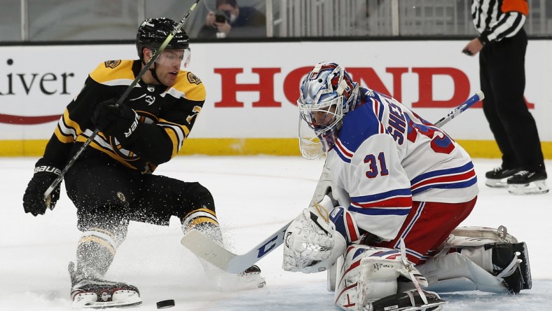 May 8, 2021; Boston, Massachusetts, USA; New York Rangers goaltender Igor Shesterkin (31) stops Boston Bruins left wing Taylor Hall (71) on a breakaway during the third period at TD Garden. Mandatory Credit: Winslow Townson-USA TODAY Sports