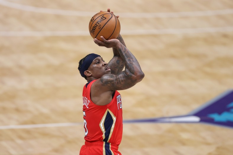 May 9, 2021; Charlotte, North Carolina, USA; New Orleans Pelicans guard Eric Bledsoe (5) shoots against the Charlotte Hornets in the first half at Spectrum Center. The New Orleans Pelicans won 112-110. Mandatory Credit: Nell Redmond-USA TODAY Sports