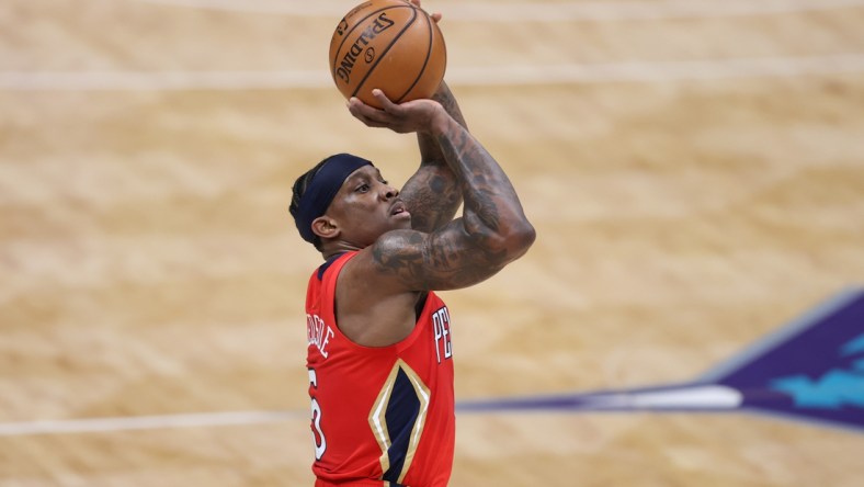May 9, 2021; Charlotte, North Carolina, USA; New Orleans Pelicans guard Eric Bledsoe (5) shoots against the Charlotte Hornets in the first half at Spectrum Center. The New Orleans Pelicans won 112-110. Mandatory Credit: Nell Redmond-USA TODAY Sports