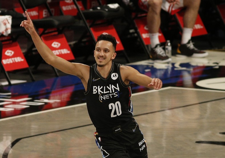May 15, 2021; Brooklyn, New York, USA; Brooklyn Nets guard Landry Shamet (20) reacts after hitting a three point basket against the Chicago Bulls during the first half at Barclays Center. Mandatory Credit: Andy Marlin-USA TODAY Sports