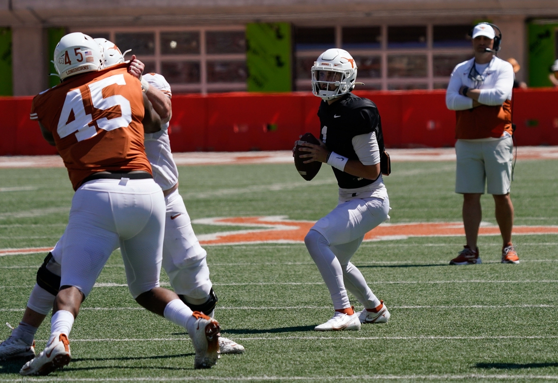 Apr 24, 2021; Austin, Texas, USA; Texas Longhorns White quarterback Hudson Card (1) looks to pass against the Texas Longhorns Orange team in the fourth quarter at the Orange-White Texas Spring Game at Darrell K Royal-Texas Memorial Stadium. Mandatory Credit: Scott Wachter-USA TODAY Sports